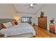 Bright main bedroom featuring hardwood floors and ample space at 2337 Platinum Dr, Sun City Center, FL 33573