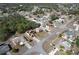 Residential neighborhood aerial view showcasing houses with pools, solar panels and tree-lined streets at 2359 Gimlet Ave, Spring Hill, FL 34608