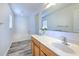 Bright bathroom with soaking tub and hardwood floors at 2359 Gimlet Ave, Spring Hill, FL 34608