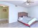 Light-filled bedroom features hardwood floors and neutral walls at 2359 Gimlet Ave, Spring Hill, FL 34608