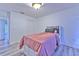 Bedroom featuring modern flooring, a comfortable bed, and plenty of natural light at 2359 Gimlet Ave, Spring Hill, FL 34608