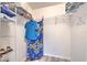 Walk-in closet includes wire rack shelving and hardwood floors at 2359 Gimlet Ave, Spring Hill, FL 34608