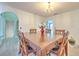 Dining room featuring an arched entryway and chandelier lighting at 2359 Gimlet Ave, Spring Hill, FL 34608