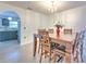 Dining room featuring an arched entryway leading into the kitchen at 2359 Gimlet Ave, Spring Hill, FL 34608