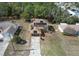 Two-story home featuring solar panels, an attached garage, and a well-manicured front yard at 2359 Gimlet Ave, Spring Hill, FL 34608