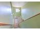 Foyer showing the front door and unique architectural details from a high angle at 2359 Gimlet Ave, Spring Hill, FL 34608