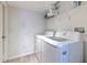 Bright laundry room with a side by side washer and dryer at 2359 Gimlet Ave, Spring Hill, FL 34608