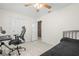 Bedroom with a desk, chair, and double bed at 2708 Fulton Sw St, Largo, FL 33774