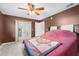 Bedroom with a double bed and ceiling fan at 2708 Fulton Sw St, Largo, FL 33774