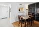 Dining area with granite top table and built in shelving at 464 N Paula Dr # 322, Dunedin, FL 34698