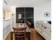 Dining area with granite-topped table and four chairs at 464 N Paula Dr # 322, Dunedin, FL 34698