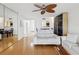 Spacious living room with hardwood floors and kitchen pass-through at 464 N Paula Dr # 322, Dunedin, FL 34698