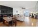 Bright living room with water views, hardwood floors, and comfortable seating at 464 N Paula Dr # 322, Dunedin, FL 34698
