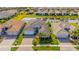 Aerial view of house and neighborhood, showcasing curb appeal at 4919 Pamplona Ct., Wimauma, FL 33598