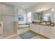 Elegant bathroom with soaking tub and walk-in shower at 4919 Pamplona Ct., Wimauma, FL 33598