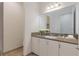 Modern bathroom with a vanity, sink, and toilet at 4919 Pamplona Ct., Wimauma, FL 33598