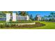 Valencia del Sol community entrance with lush landscaping at 4919 Pamplona Ct., Wimauma, FL 33598