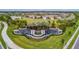 Entrance to Valencia Del Sol with a fountain and landscaping at 4919 Pamplona Ct., Wimauma, FL 33598