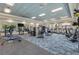 Fitness center with various cardio and weight training equipment at 4919 Pamplona Ct., Wimauma, FL 33598