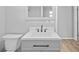 Modern bathroom with white vanity and updated fixtures at 4923 Azalea Dr, New Port Richey, FL 34652