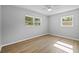Spacious bedroom with new flooring and ceiling fan at 4923 Azalea Dr, New Port Richey, FL 34652