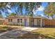 Well-maintained ranch home with a covered carport at 4923 Azalea Dr, New Port Richey, FL 34652