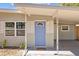 Updated front door with stylish light blue paint at 4923 Azalea Dr, New Port Richey, FL 34652