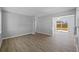 Open living space with sliding glass doors to backyard at 4923 Azalea Dr, New Port Richey, FL 34652