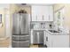Modern kitchen with stainless steel appliances and granite countertops at 1010 59Th N Ave, St Petersburg, FL 33703