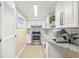 Modern kitchen with stainless steel appliances and granite countertops at 1010 59Th N Ave, St Petersburg, FL 33703