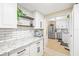 Modern kitchen with stainless steel appliances and granite countertops at 1010 59Th N Ave, St Petersburg, FL 33703