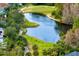 Golf course with pond and lush landscape at 10106 Radcliffe Dr, Tampa, FL 33626