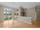 Dining area with hardwood floors, large windows, and chandelier at 10106 Radcliffe Dr, Tampa, FL 33626