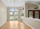 Dining area with hardwood floors, large windows, and chandelier at 10106 Radcliffe Dr, Tampa, FL 33626
