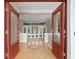 Open entryway with double red doors leading into the living area at 10106 Radcliffe Dr, Tampa, FL 33626