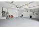 Attached garage with ample storage and epoxy floor at 10106 Radcliffe Dr, Tampa, FL 33626