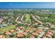 Aerial view of Siena community showcasing upscale homes and golf course at 10639 Ruffino Ct, Trinity, FL 34655