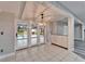 Bright dining area with access to a pool and backyard at 11303 Leprechaun Dr, Riverview, FL 33569