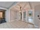 Dining room with sliding glass doors leading to the pool area at 11303 Leprechaun Dr, Riverview, FL 33569