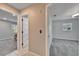 Bright hallway with doors leading to bedrooms at 11303 Leprechaun Dr, Riverview, FL 33569