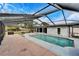 Screened-in pool with brick pavers at 11303 Leprechaun Dr, Riverview, FL 33569