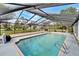 Screened-in pool with brick pavers at 11303 Leprechaun Dr, Riverview, FL 33569