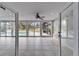 Bright sunroom with pool view and tile floors at 11303 Leprechaun Dr, Riverview, FL 33569