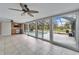 Sunroom with pool view and tile floors at 11303 Leprechaun Dr, Riverview, FL 33569