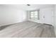 Bright living room with modern flooring and ample natural light, a welcoming space at 11801 104Th St, Largo, FL 33773