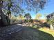Backyard with shed and stone pathway at 143 44Th N Ave, St Petersburg, FL 33703