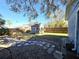 Large backyard with shed, gravel pathway, and wood fence at 143 44Th N Ave, St Petersburg, FL 33703