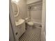 Bathroom with bathtub, toilet and white vanity at 143 44Th N Ave, St Petersburg, FL 33703