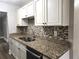 Kitchen with granite countertops and stainless steel sink at 143 44Th N Ave, St Petersburg, FL 33703