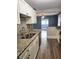 Updated kitchen with granite countertops and stainless steel appliances at 143 44Th N Ave, St Petersburg, FL 33703